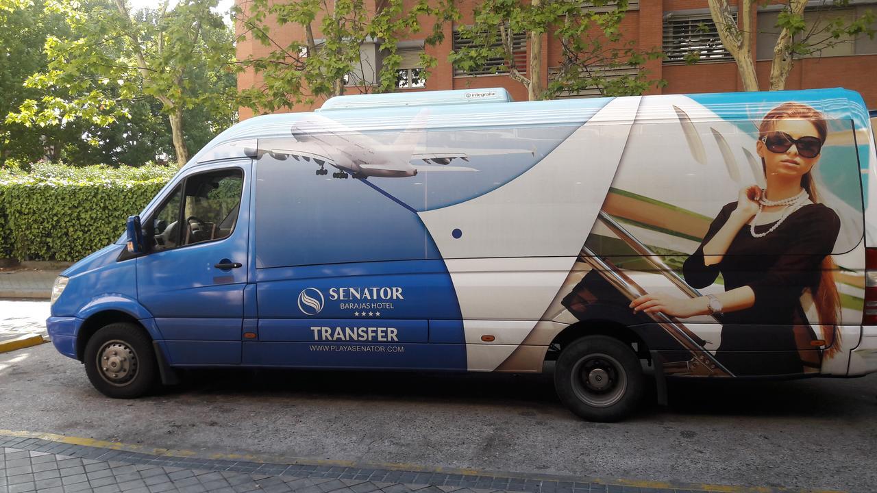 Senator Barajas Hotel Madrid Exterior photo Advertising on a bus